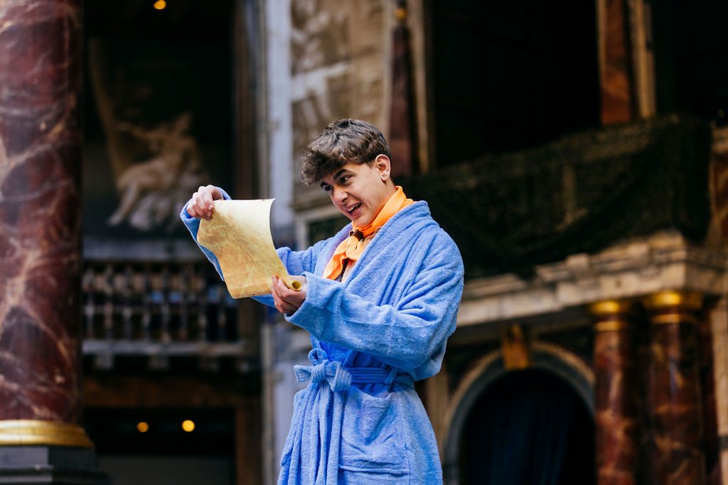 Young actors performing in a Globe Young Company production of Cressida at the Globe Theatre in 2025.