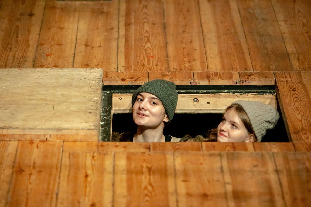 Young actors performing in a Globe Young Company production of Cymbeline at the Sam Wanamaker Playhouse in 2022.