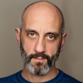 This is a headshot of Richard Katz looking directly to camera.