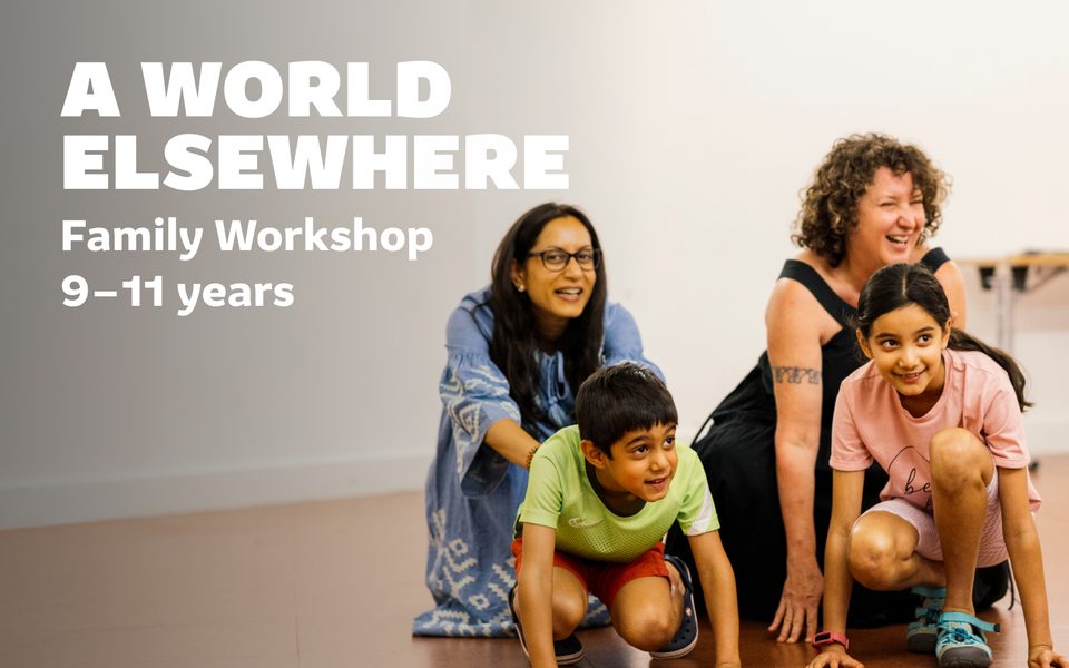 Two children kneel on the floor and two adults kneel behind them, laughing whilst taking part in a family workshop. A World Elsewhere: Family Workshop (9-11 years)