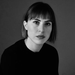 An actor looking into the camera.